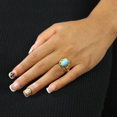 Ring aus 18 Karat Gelbgold mit Türkis