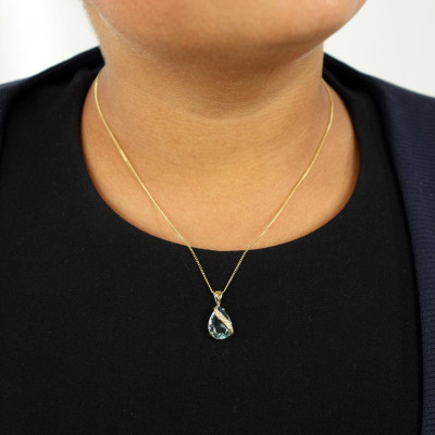Pendentif en Or jaune 18k avec Topaze bleue et Diamants